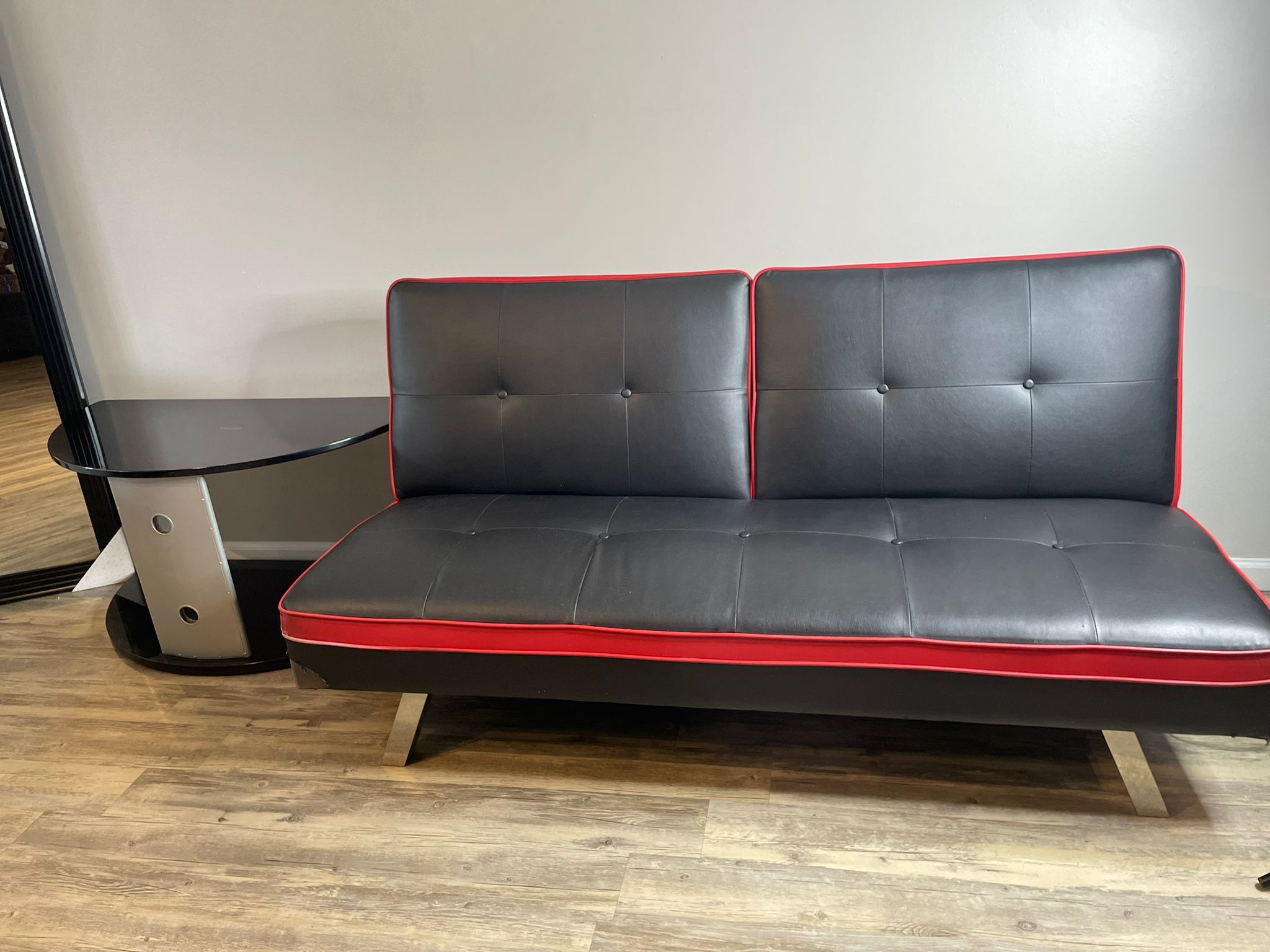 Futon In Black And Red Leather
