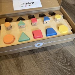 KiwiCo pop-up shape sorter puzzle