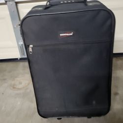 VERY GOOD CONDITION. SMALL BLACK SUIT CASE. 