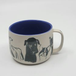 Anthropologie Dog Person Mug Cream Stoneware  Blue 12 oz Coffee Cup Mug 
.  Pre-owned, very good shape, please see photos for details. It is 3". 
Weig
