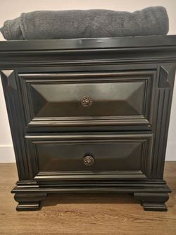 One Black Nightstand