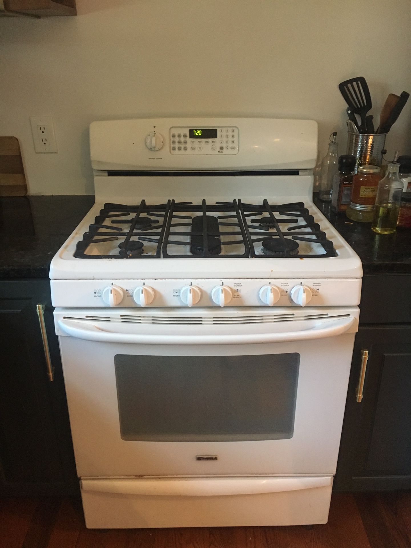 White range, dishwasher, and microwave