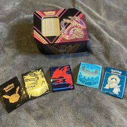 Pokemon collecters bundle, tin with collecters card and sleeves holos included