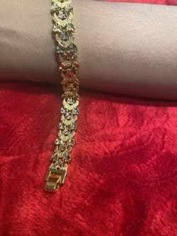 Gold braclet with little hearts