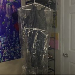 Black Dress With Silver Accents Cut Open On Both Sides