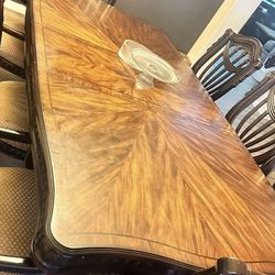 Solid wood dinner table with two leafs
