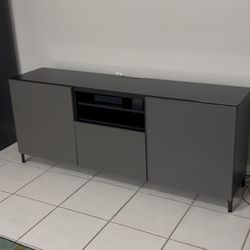 Gray Tv Stand With Storage Space And Touch Latch System To Open