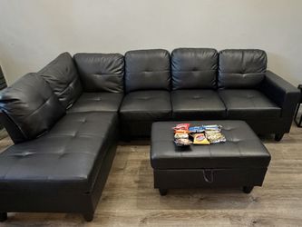 black faux leather sectional sofa