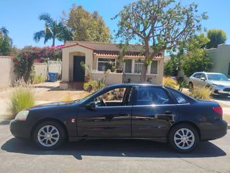 2003 Saturn l20 runs good ice cold AC new registration new tires great commuter car
