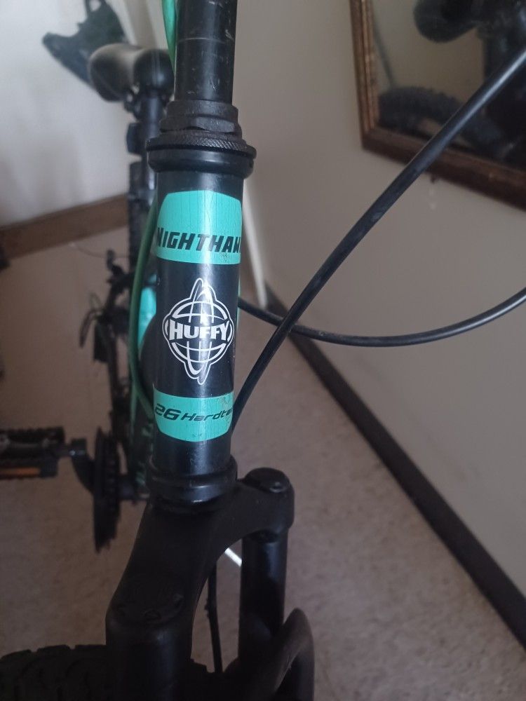 HUFFY MOUNTAIN MENS BIKE, 18 SPEED, 26 INCH,USE BUT STILL LOOKING GOOD, NEW TIRES,ONLY PICK UP