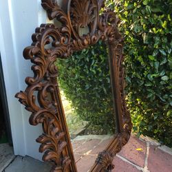 Beautiful faux wood mirror  Approximately 47 1/2” T x35”