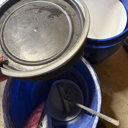 Mixing barrels and gauge rakes.