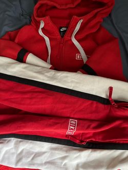Red and white Nike tracksuit