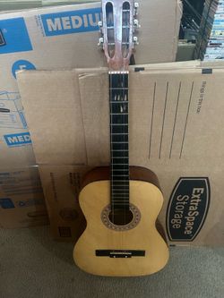 Guitar for an artist. It has a crack in the neck