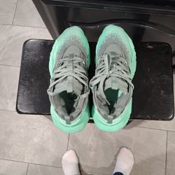 Adidas Trae Young 3 basketball shoes in the Pulse Mint and Silver Metallic colorway. 