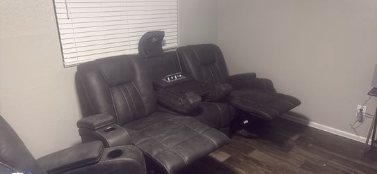 Reclining couch and recliner couch has entertainment stand