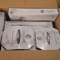 Brand New HexClad Hybrid Nonstick 7-Piece Cookware Set, 8", 10", and 12" Pans with Lids, and 10" Wok.