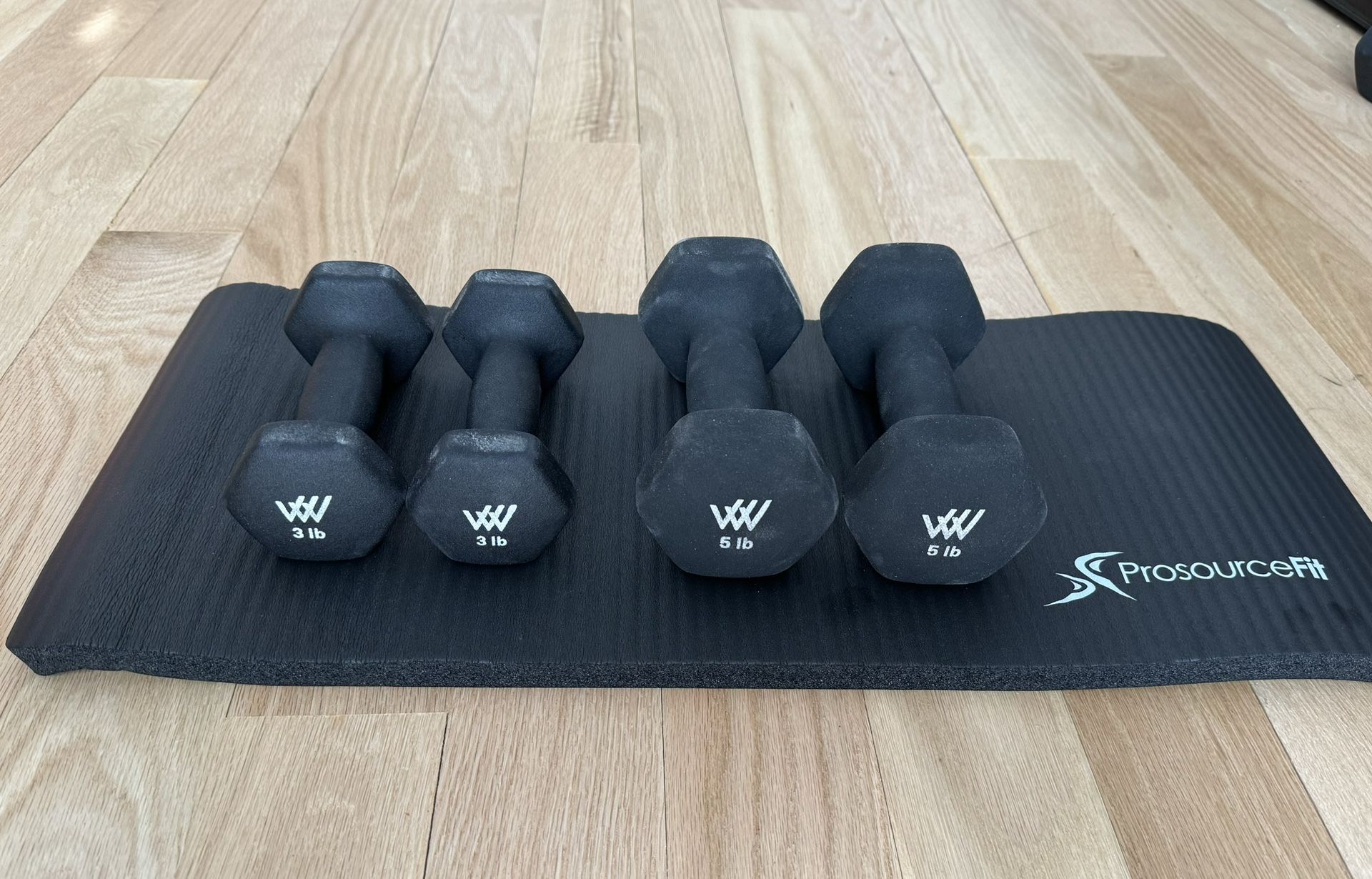 Set Of 3 And 5 Lb Dumbbells