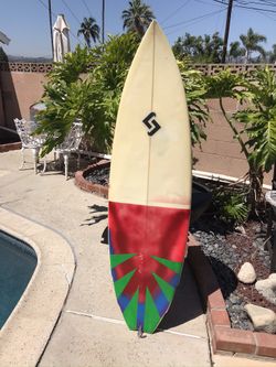 5’8” lightweight surfboard