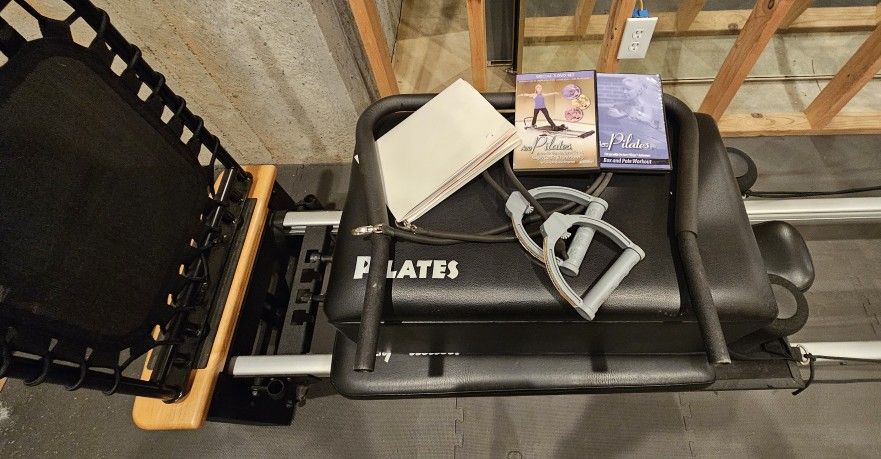 Stamina AeroPilates Pro Reformer Whole Body Resistance Padded Pilates Workout Machine with Cardio Rebounder for Home Workouts