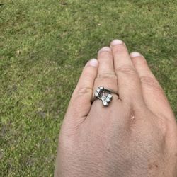 One 14k white gold bypass style channel set engagement ring,