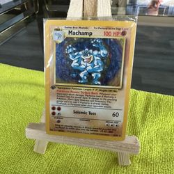 Sealed 1st Edition holo Machamp Unlimited Base Set #8/102