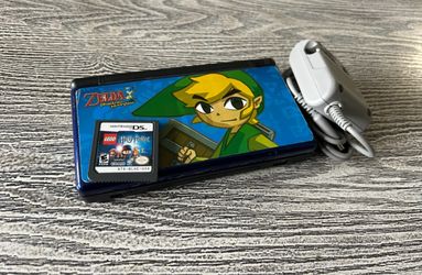 Nintendo DS Lite with Lego Harry Potter game, complete with charger.  $40