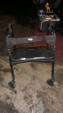 Invacare walker with seat and brakes