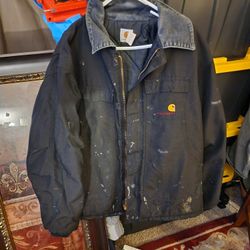vintage Carhartt jacket size xl has some paint spots