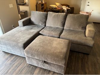 Living spaces sectional couch, pull out bed, ottoman