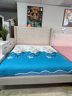 Beautiful beige color queen or king bed frame with mattress