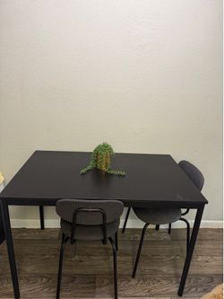 Ikea small black dinning table.