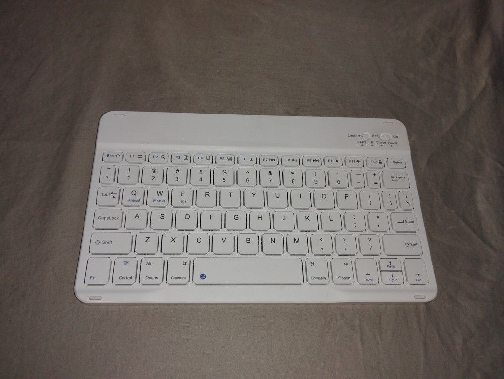 Bluetooth Keyboard Portable Rechargeable And Slim Easy Storage