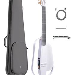 Selling a like-new Enya NEXG 2N smart acoustic-electric guitar. This is a modern carbon fiber travel