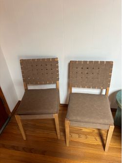Two Suede Wrapped Wood Chairs