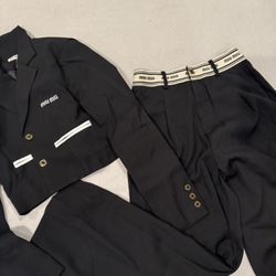 Trousers and a jacket Miu Miu