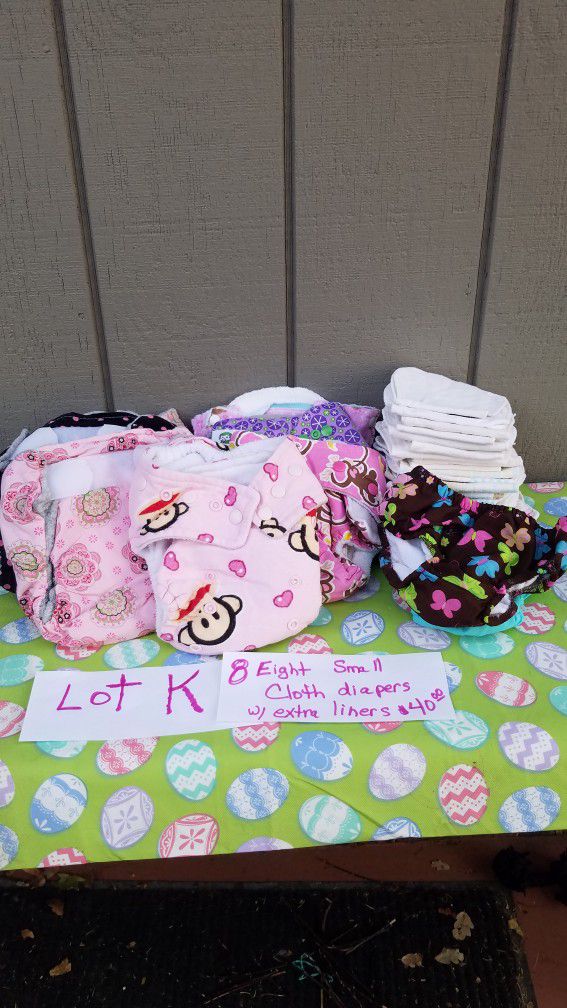 Eight Small Cloth Diapers  With Extra Liners 