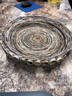 Recycled magazine art large bowl.