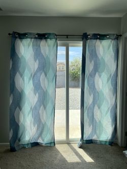 Curtains and curtain rod hardware