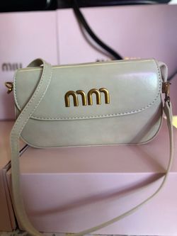 Cartera marca miu miu