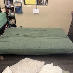 Futon with sage green cover (foldable)