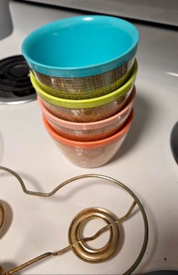 Late 50's to mid 1960s condiment bowls with metal holder.