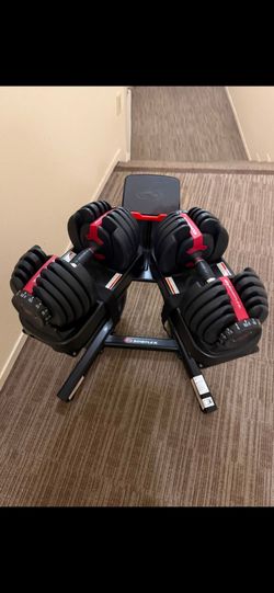 Bow Flex Dump Bells with Stand like new