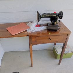 - Singer Sewing Machine 1950’s Vintage