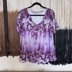Purple floral graphic print short sleeve V-neck blouse; perfect condition, brand new without tags, never worn!