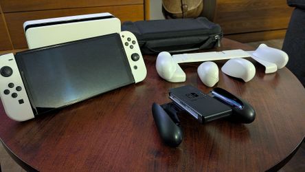 Nintendo Switch OLED model with white joy-con