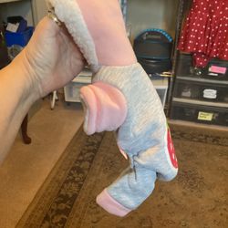  Excess pink and gray snowsuit for a dog