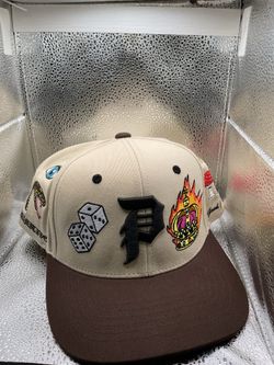 “Primitive New Snap back off white with brown  brim $25