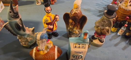 7 vintage beam decanters