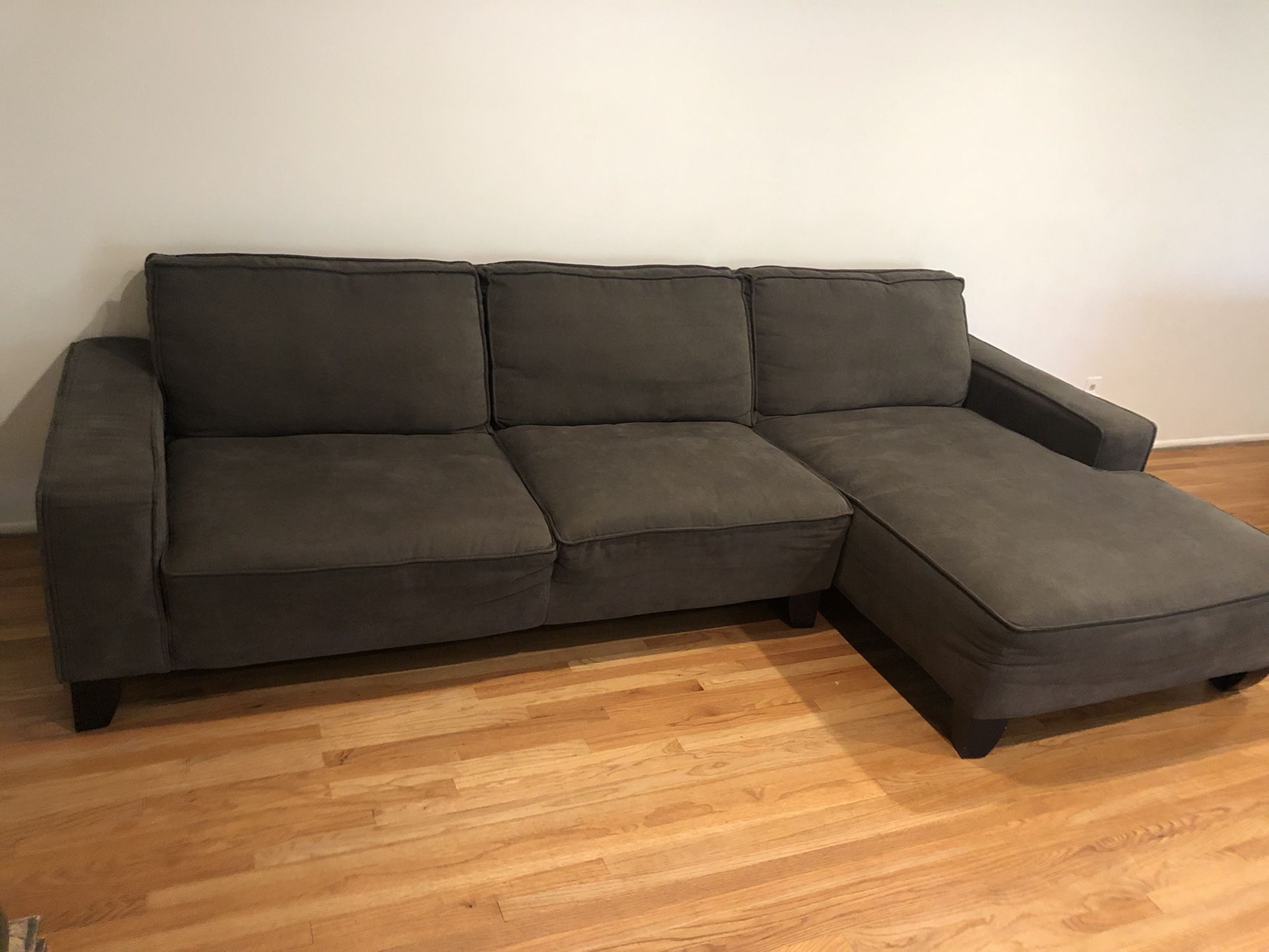 Sectional couch with storage ottoman